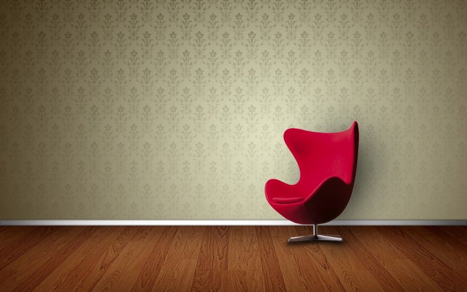 Белая стена с красным креслом