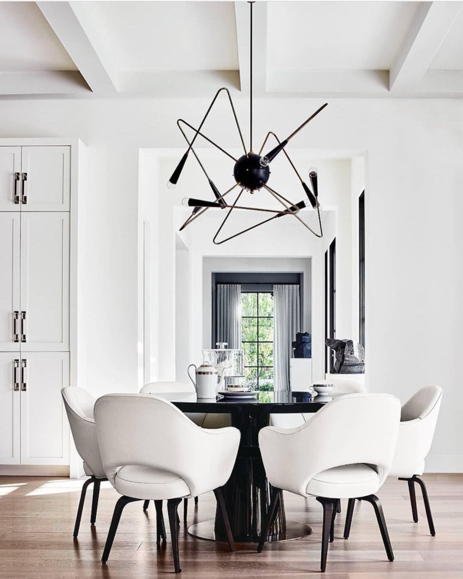 Contemporary suspended Light Fixture above Dining Table