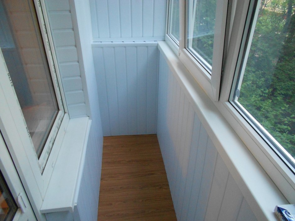 Обшивка балкона с внутренней стороны сайдингом