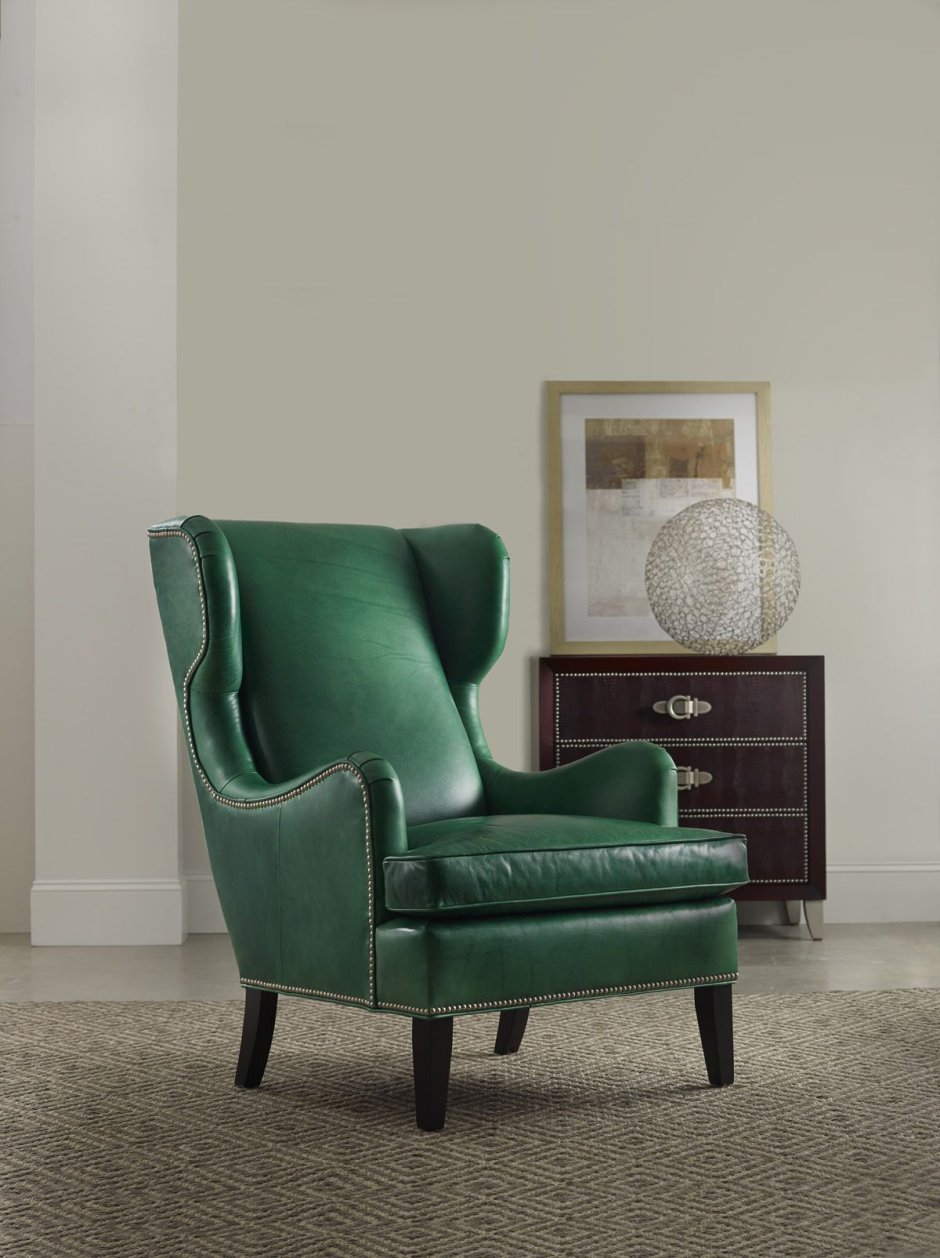 Зеленое кожаное кресло