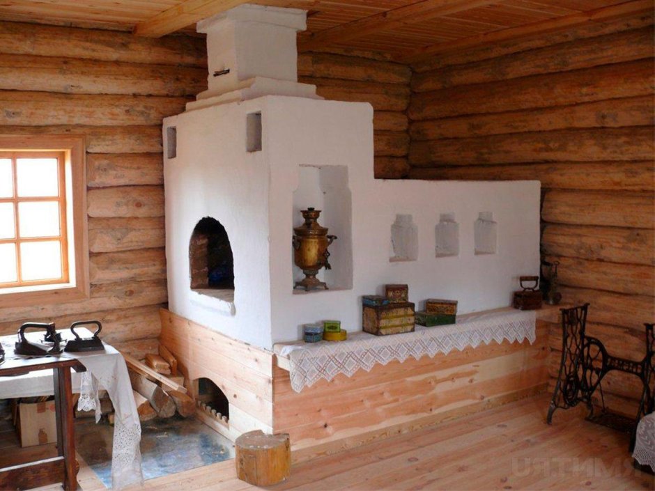 Русская печь с лежанкой в доме на винтовых сваях