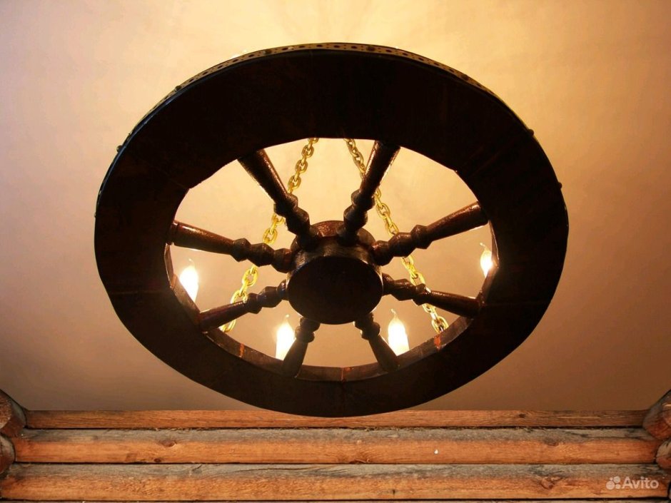 Люстра колесо в деревянный дом