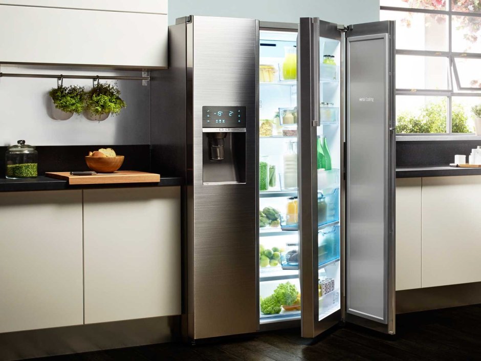 Серый холодильник в интерьере