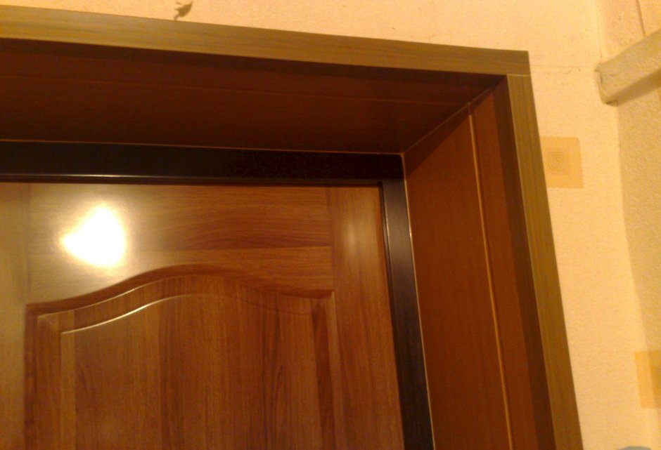 Отделка дверного проема декоративным камнем