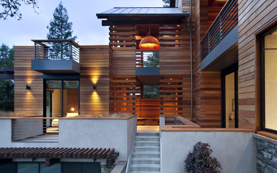 Комбинированный фасад штукатурка и планкен одноэтажный дом