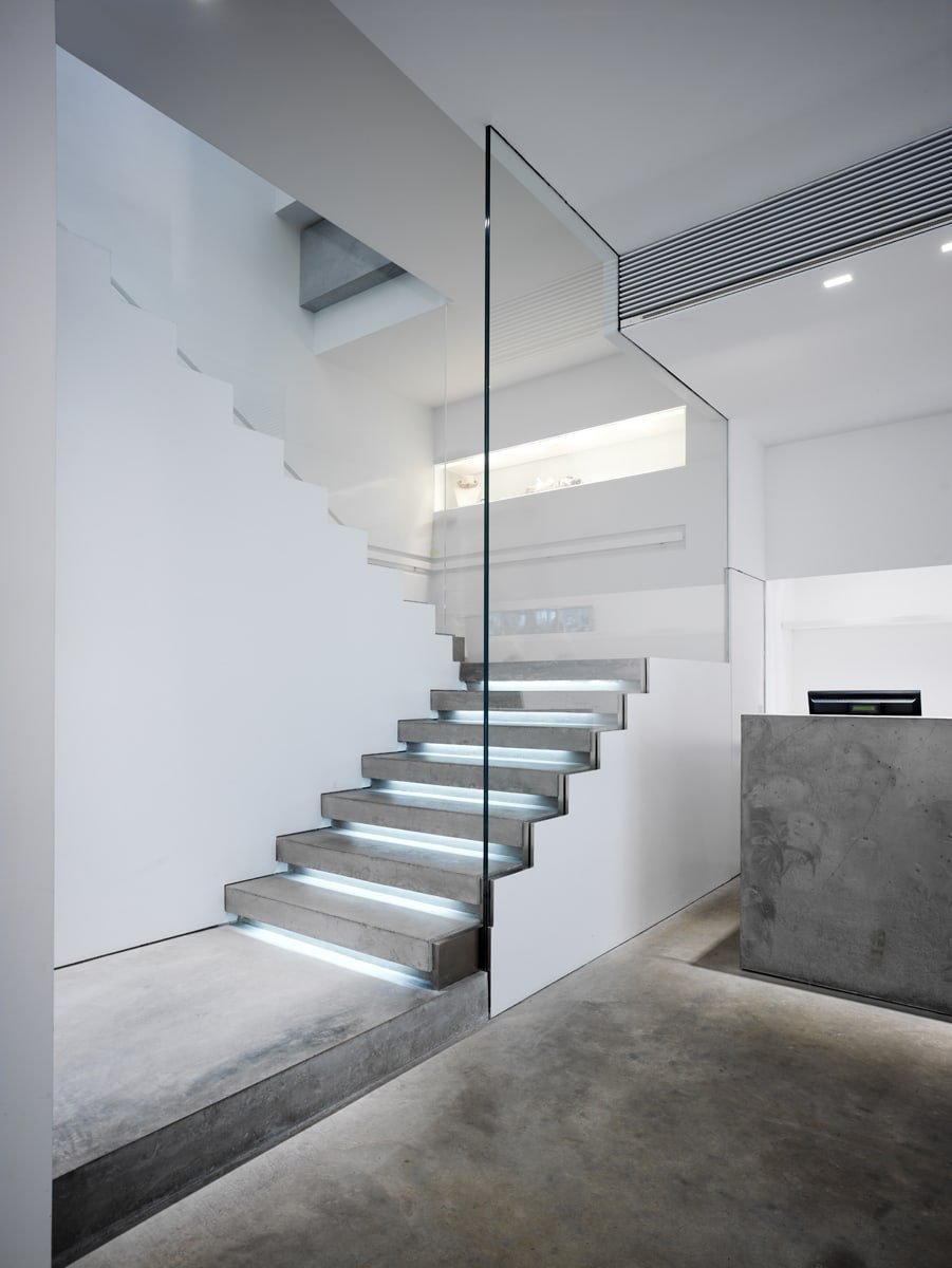 Man on the Stairs in Modern House