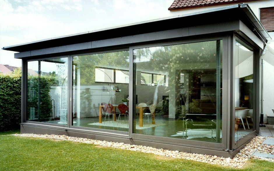 Безрамное раздвижное остекление террас