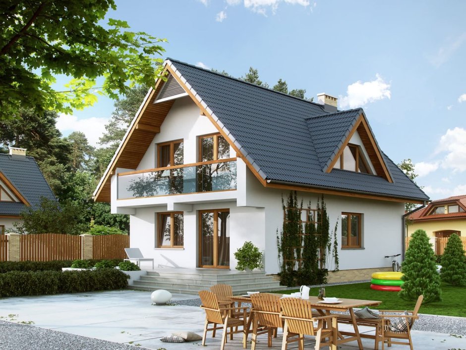 Кирпичный дом с ломаной крышей