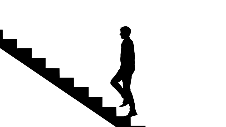 Силуэт человека поднимающегося по лестнице