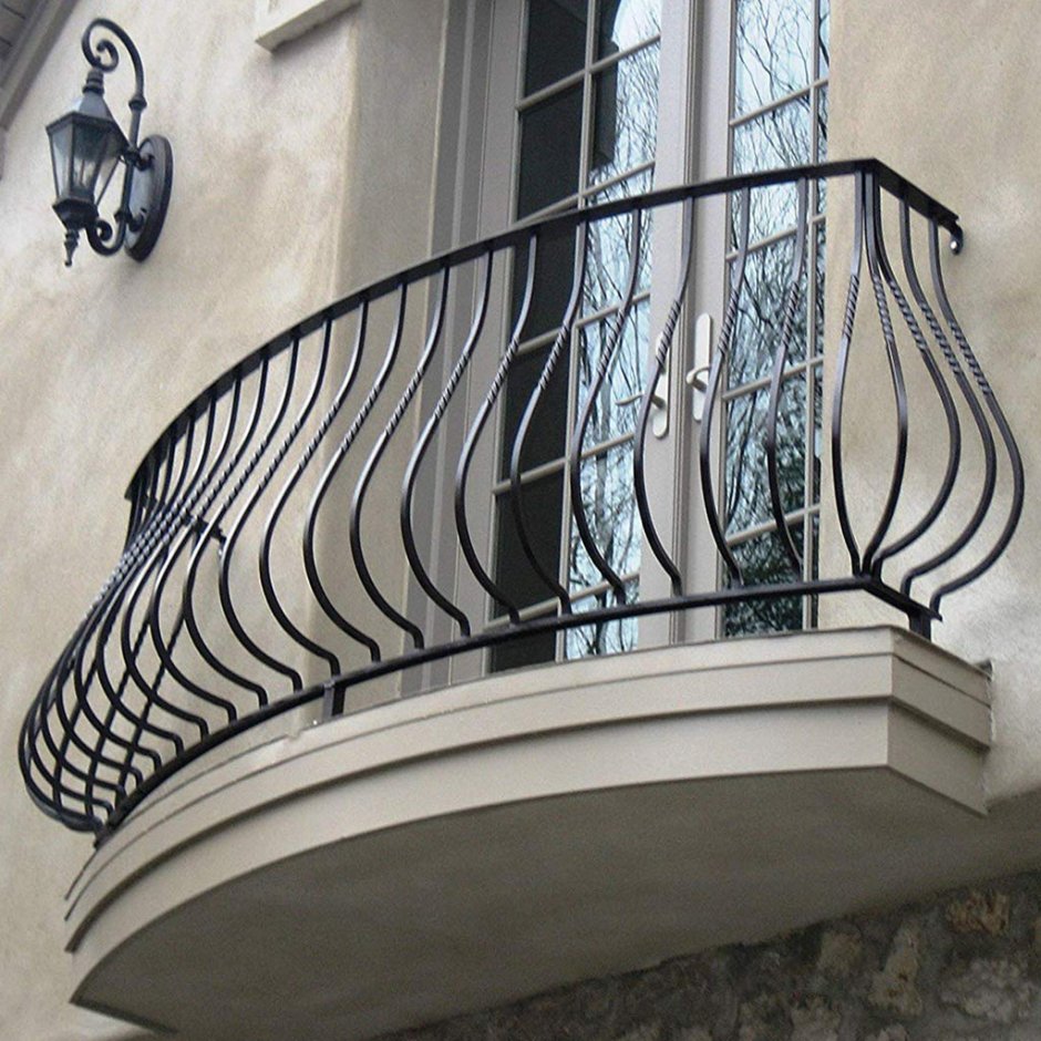 Кованые дутые балконы