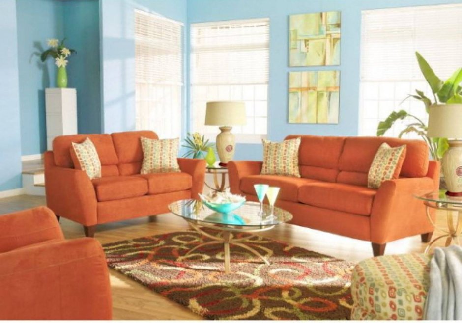 Оранжевый диван в интерьере гостиной сочетания