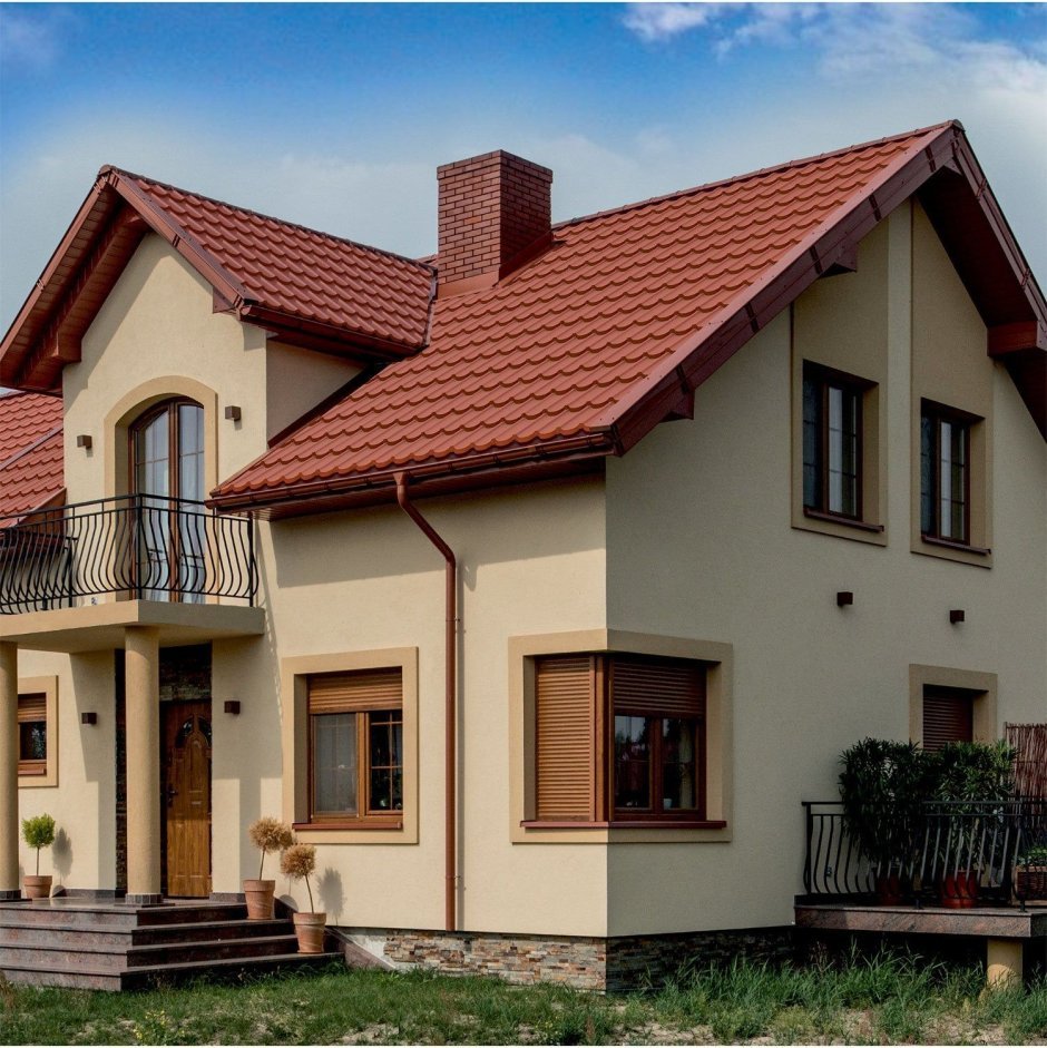 Фасад с терракотовой крышей