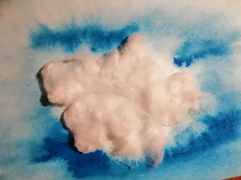 Облака из ваты на картоне