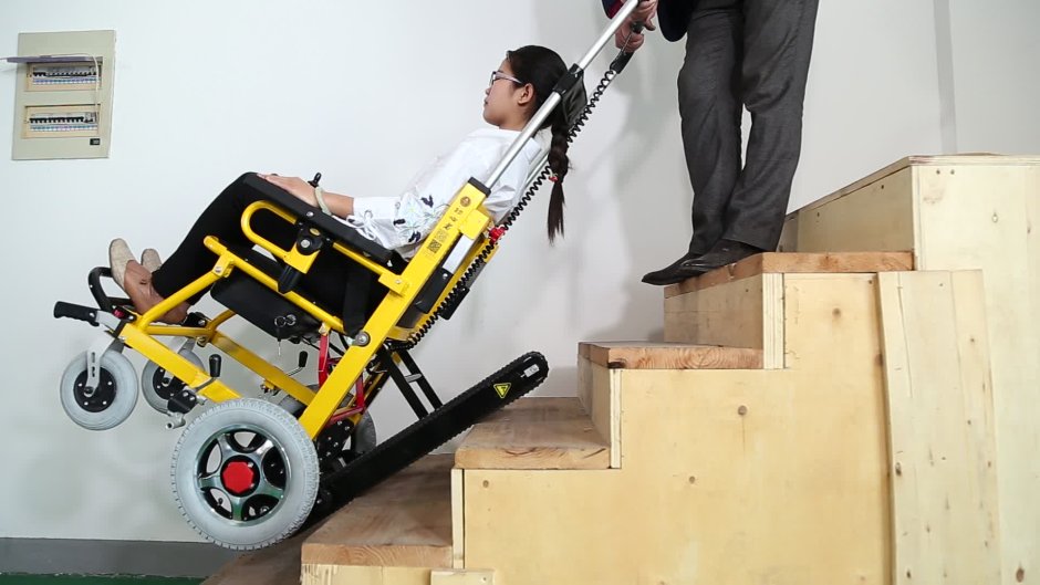 Инвалидная коляска для подъема по лестнице
