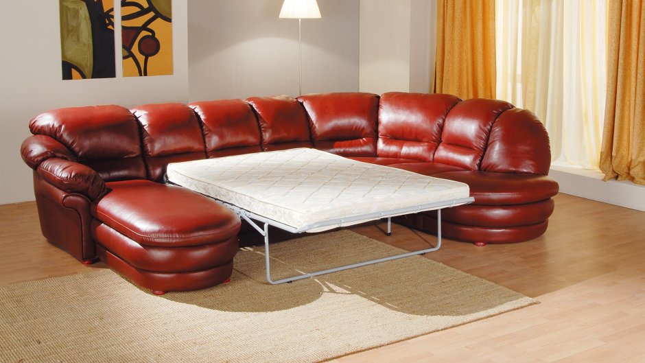 Рыжий кожаный диван угловой