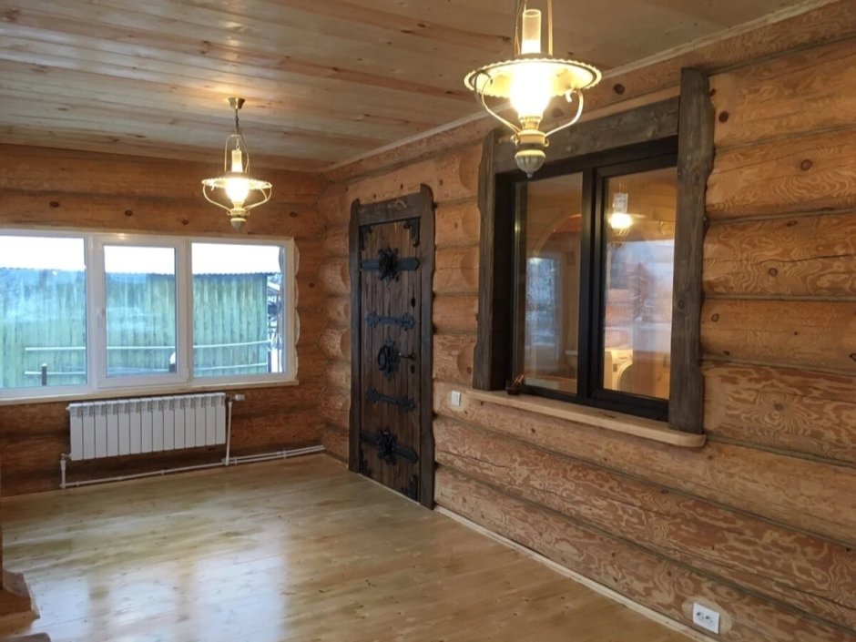 Отреставрированный бревенчатый дом