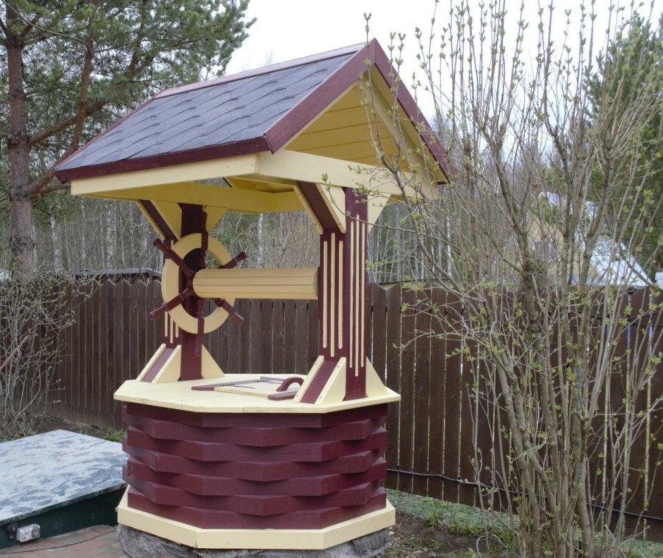 Колодец цветник на даче