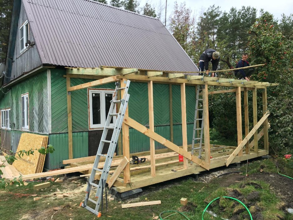 Каркасная пристройка к деревянному дому