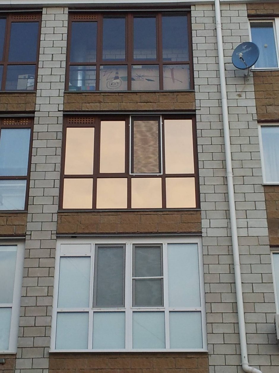 Тонированные окна на балконе