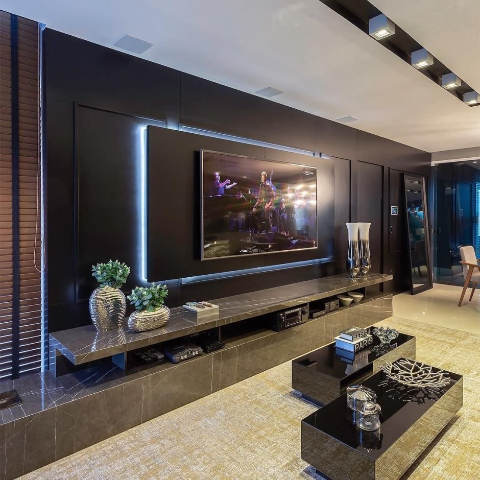 Телевизор в интерьере гостиной в современном стиле
