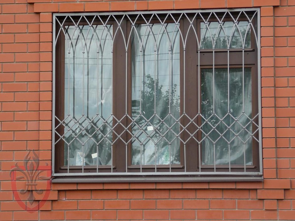 Металлические распашные решетки на окна