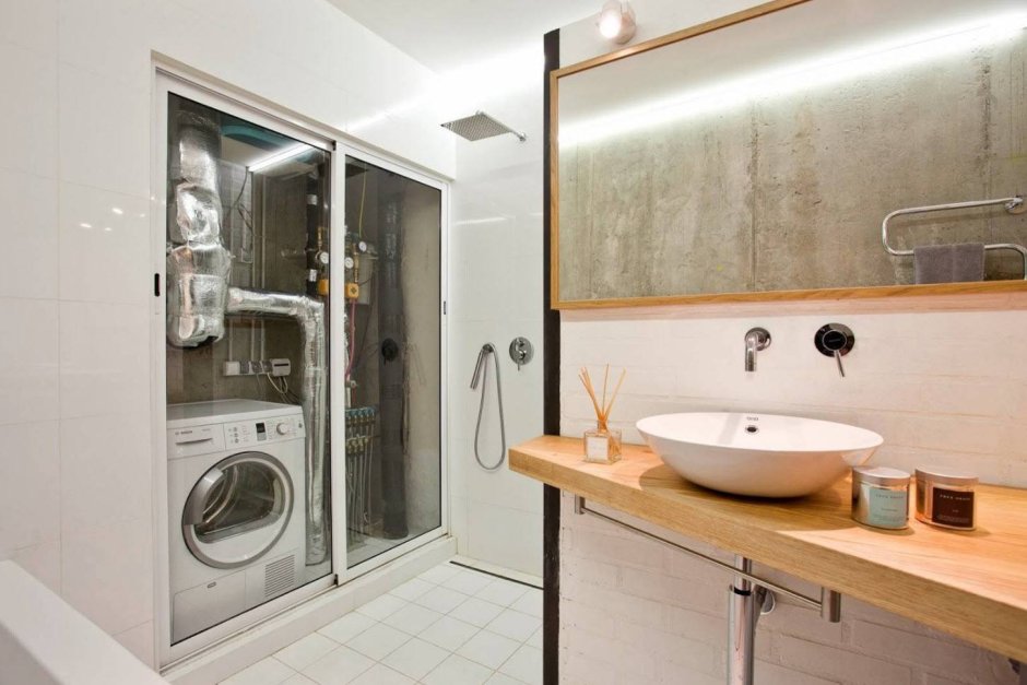 Интерьер ванной комнаты со стиральной машиной
