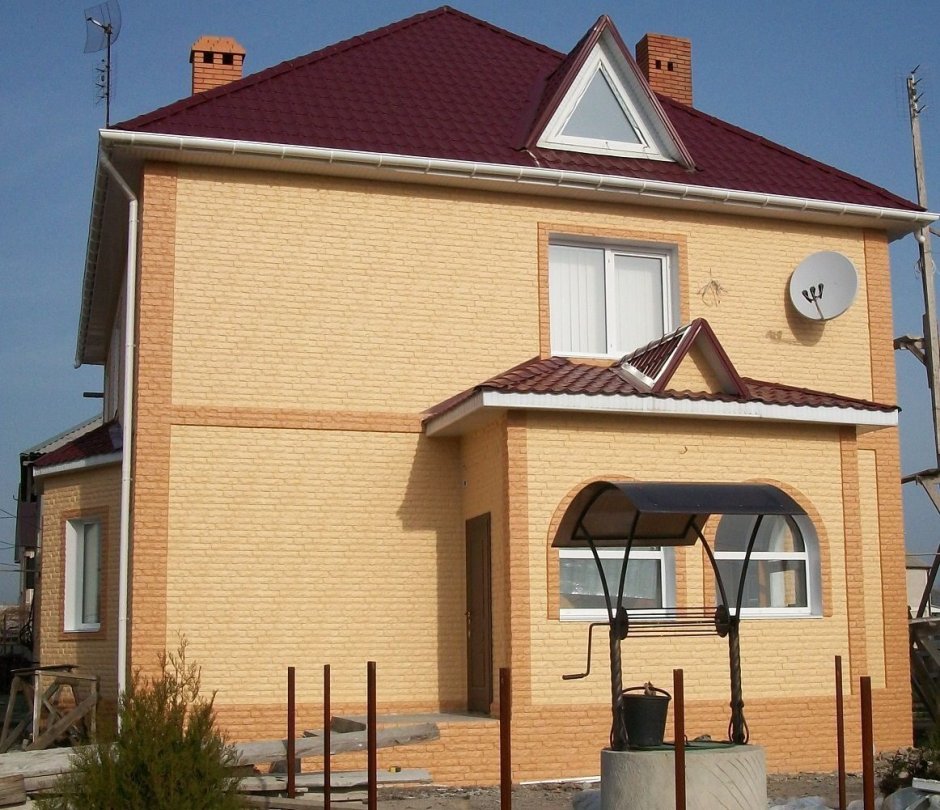 Песочный цвет фасада дома