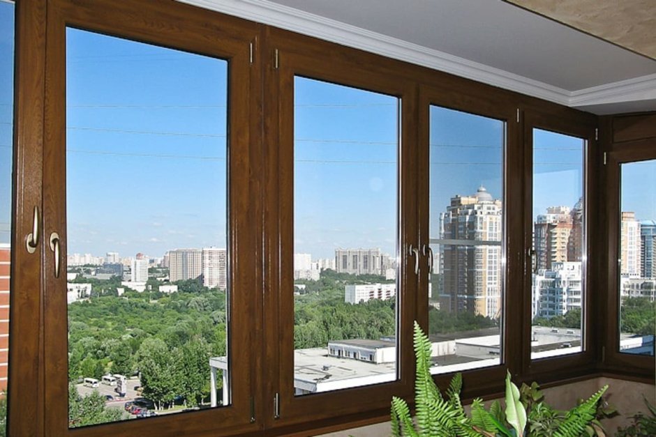 Деревянные балконные окна