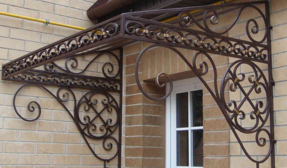 Кованые козырьки над крыльцом