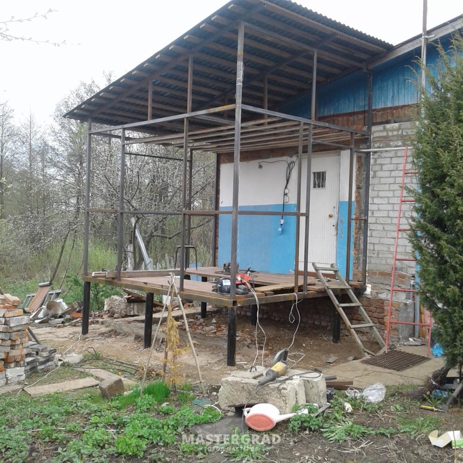 Веранда на винтовых сваях пристроенная к дому