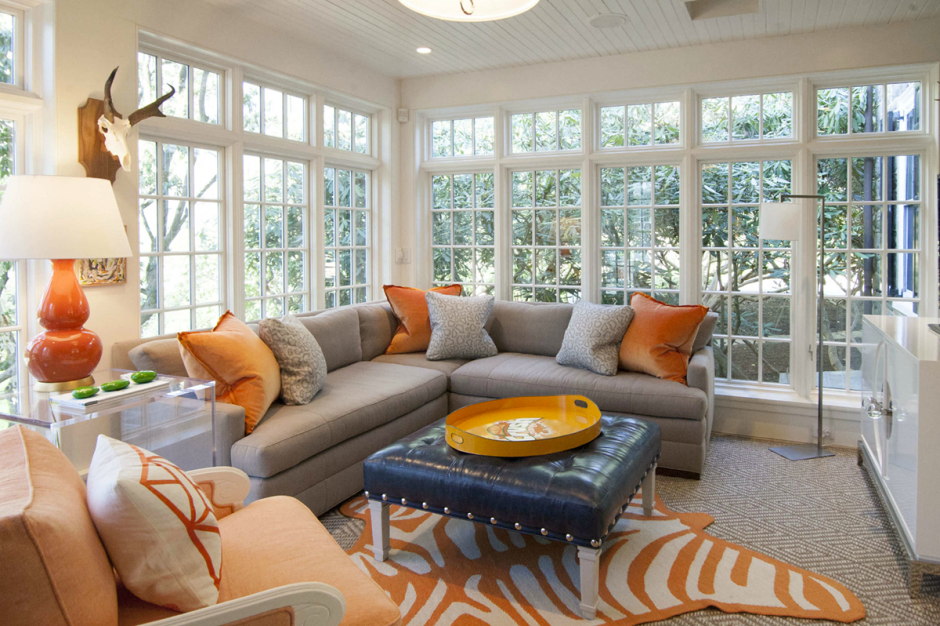 White Living Room with Orange