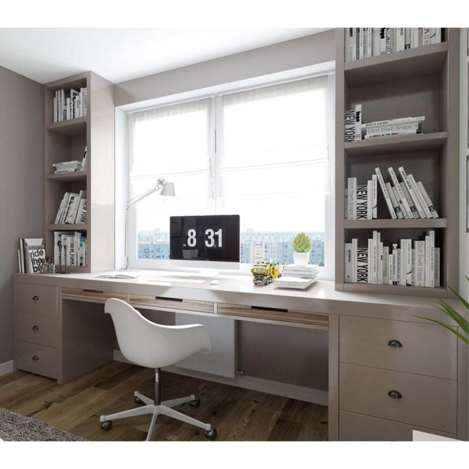 Письменный стол вдоль окна