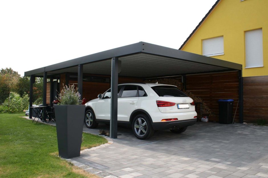 Современный гараж с навесом