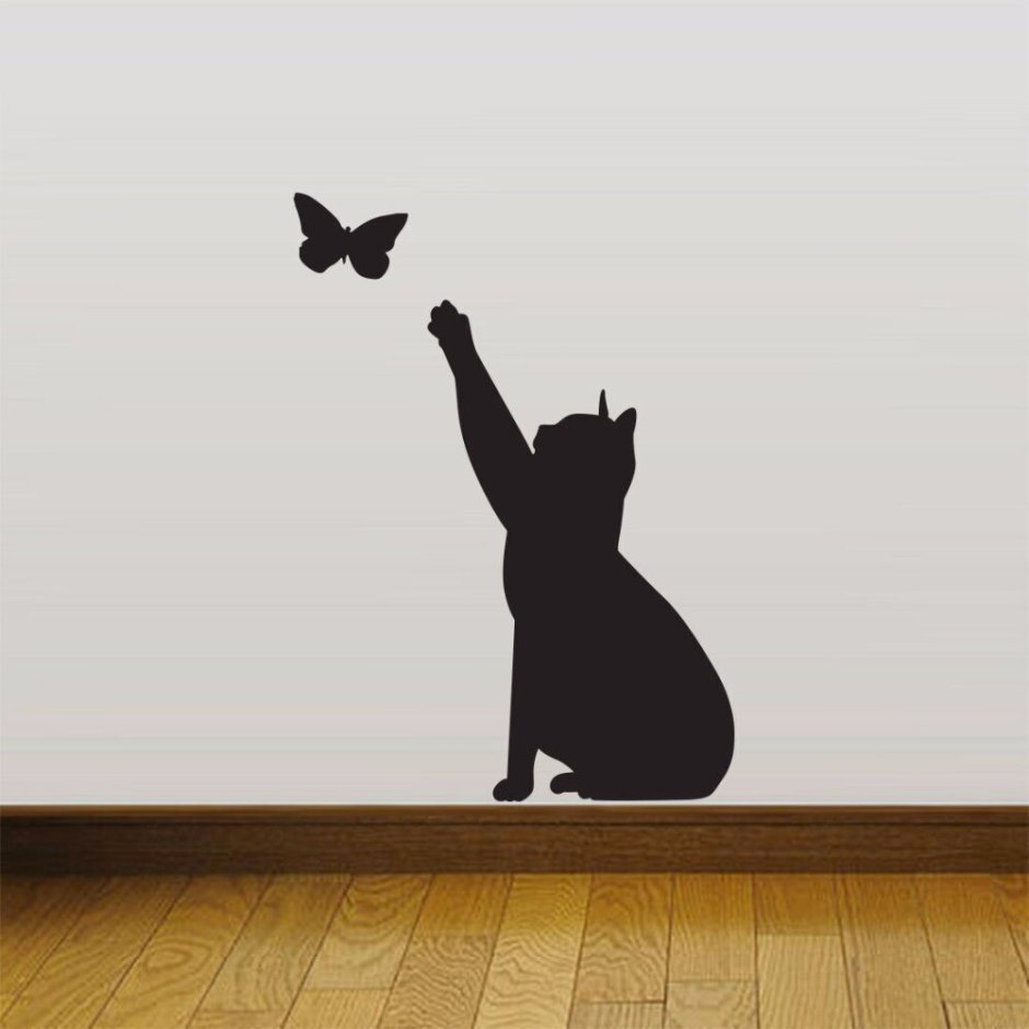 Кот на стене