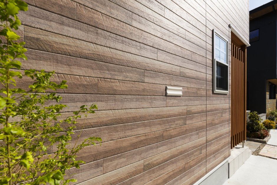 Цокольный металлосайдинг под камень