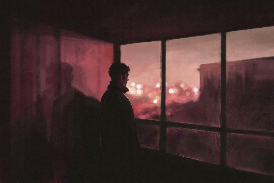 Парень сидит на окне