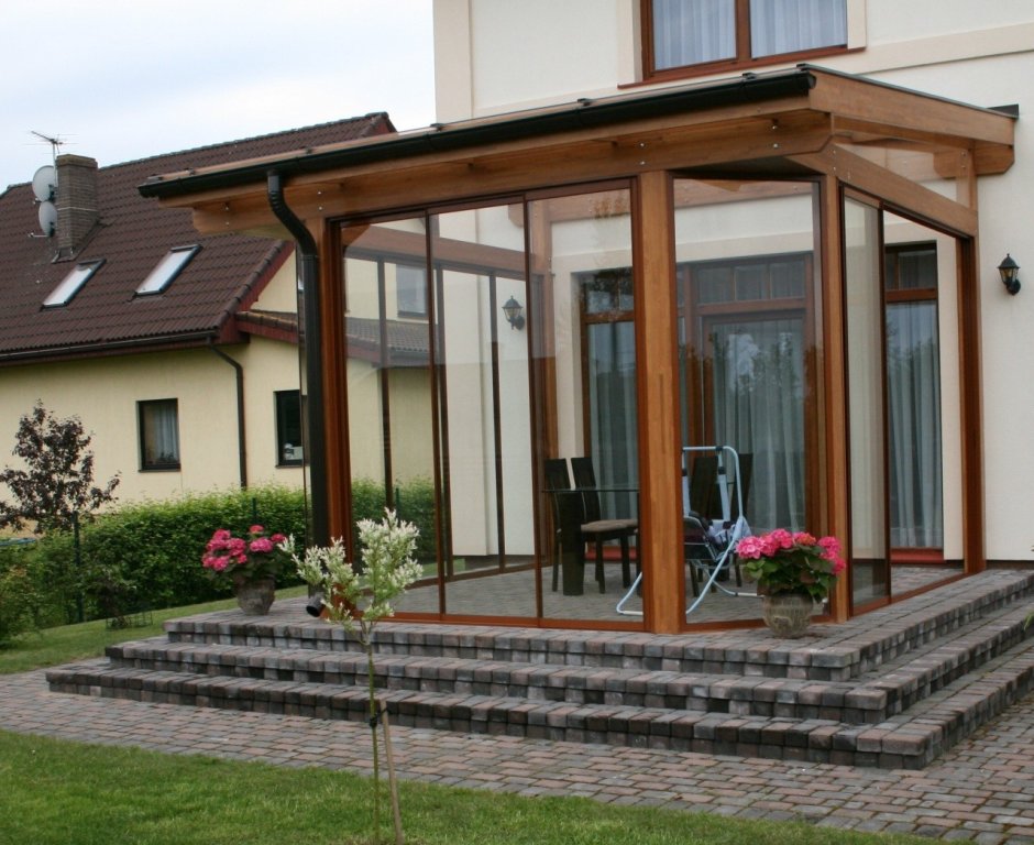 Застекленная пристройка к дому