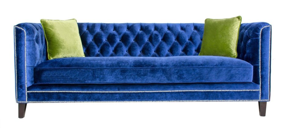 Зеленый велюровый диван в интерьере