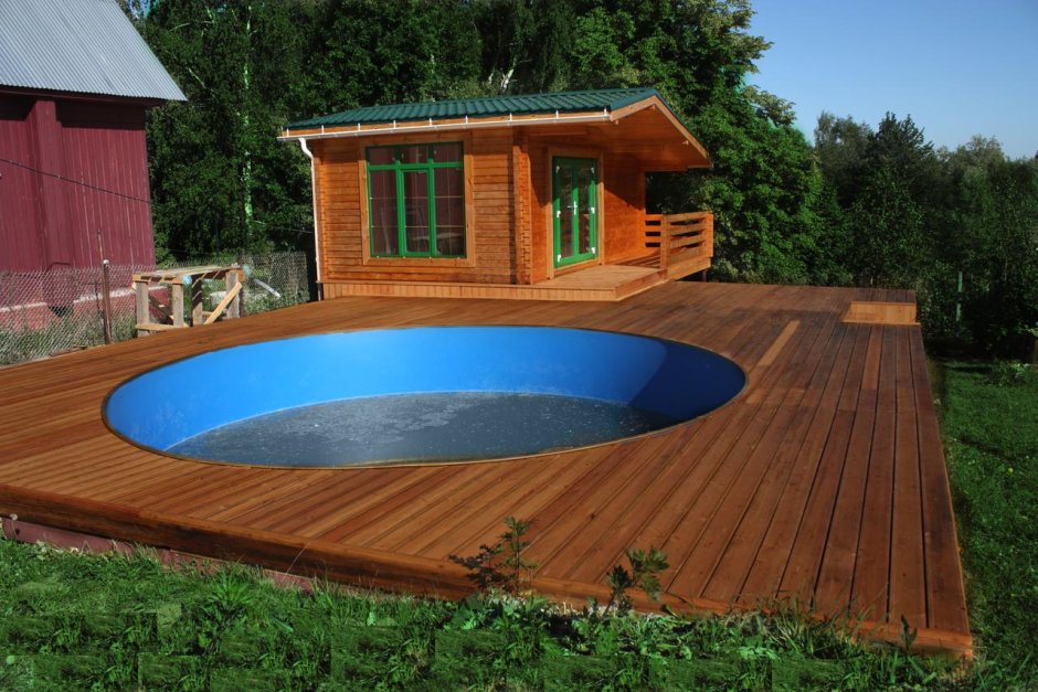 Каркасный бассейн с террасой и баней