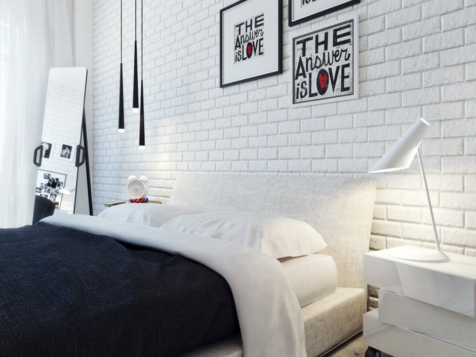 Белая кирпичная стена в спальне