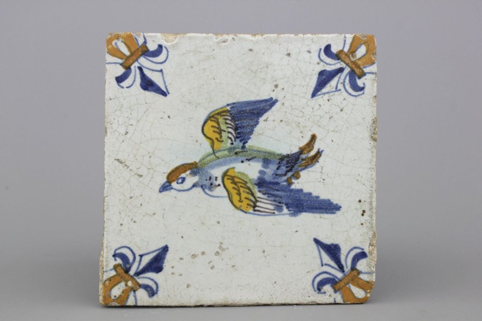 Плитка керамическая фигурная птицы
