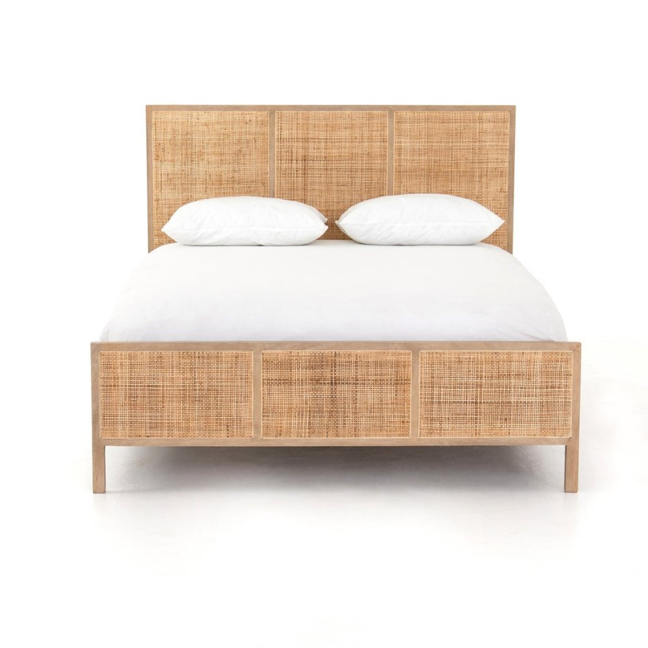 Деревянная кровать с ротанговым изголовьем