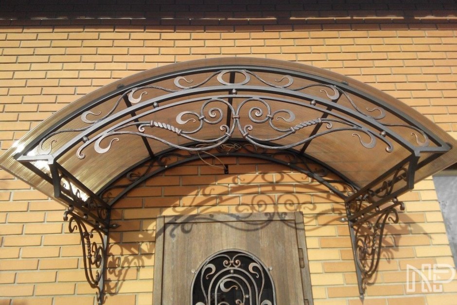 Большие кованые козырьки