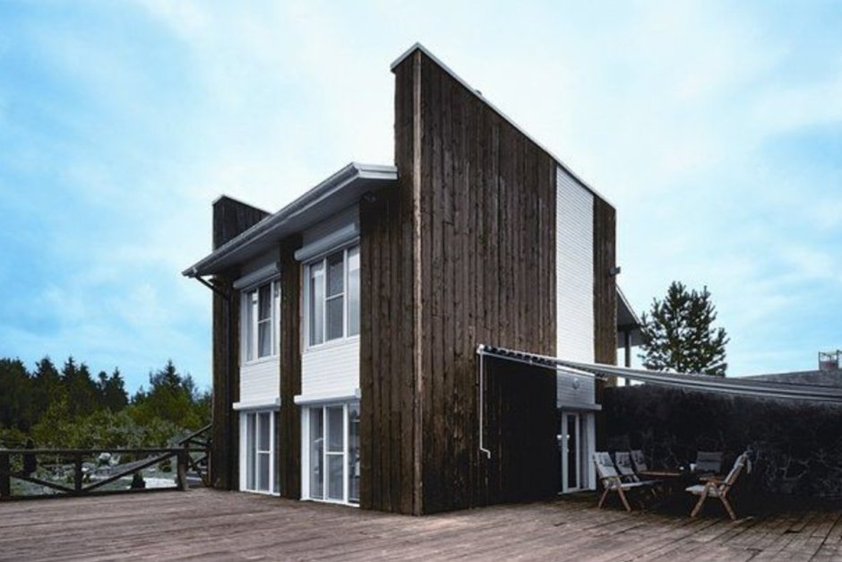 Дом в Скандинавии фасад из необрезной доски