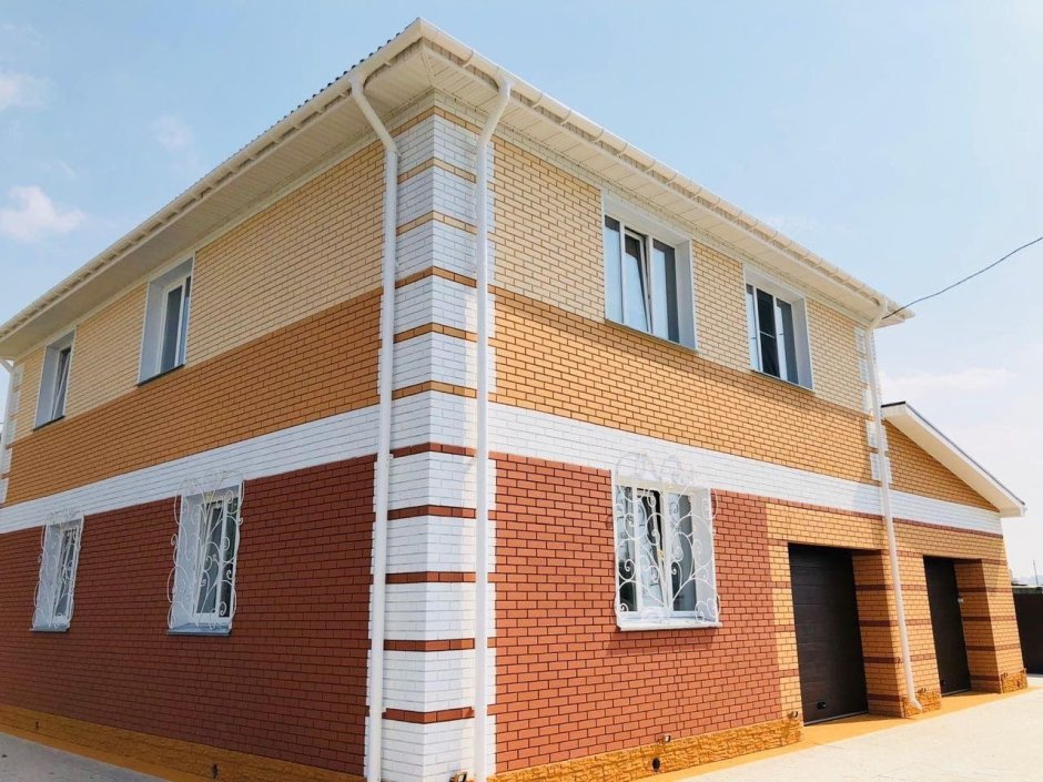 Покраска кирпичного дома
