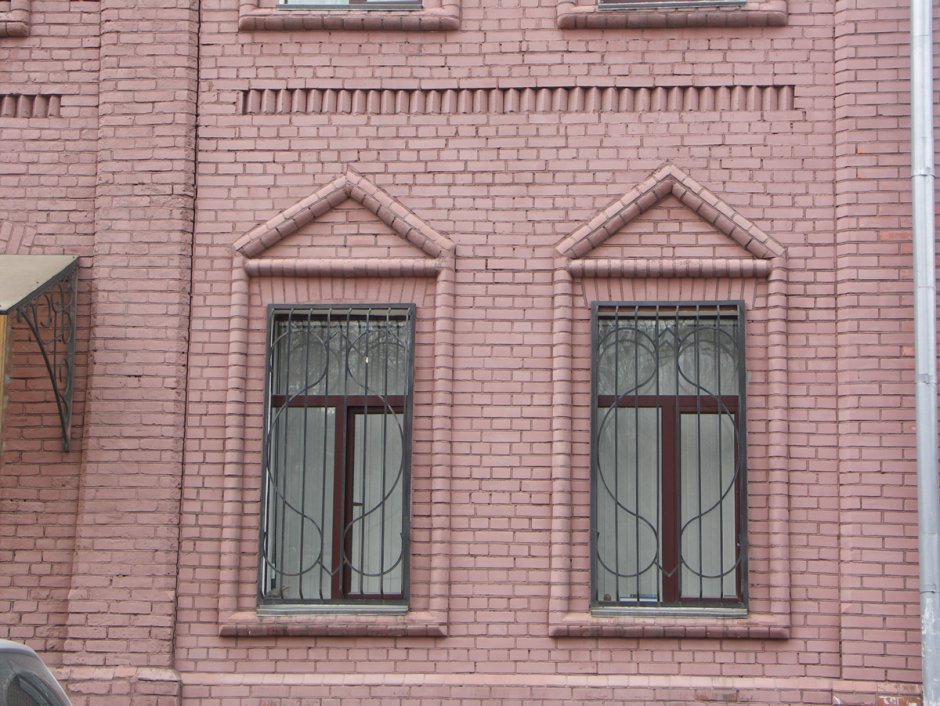 Оконные обрамления из кирпича фасад
