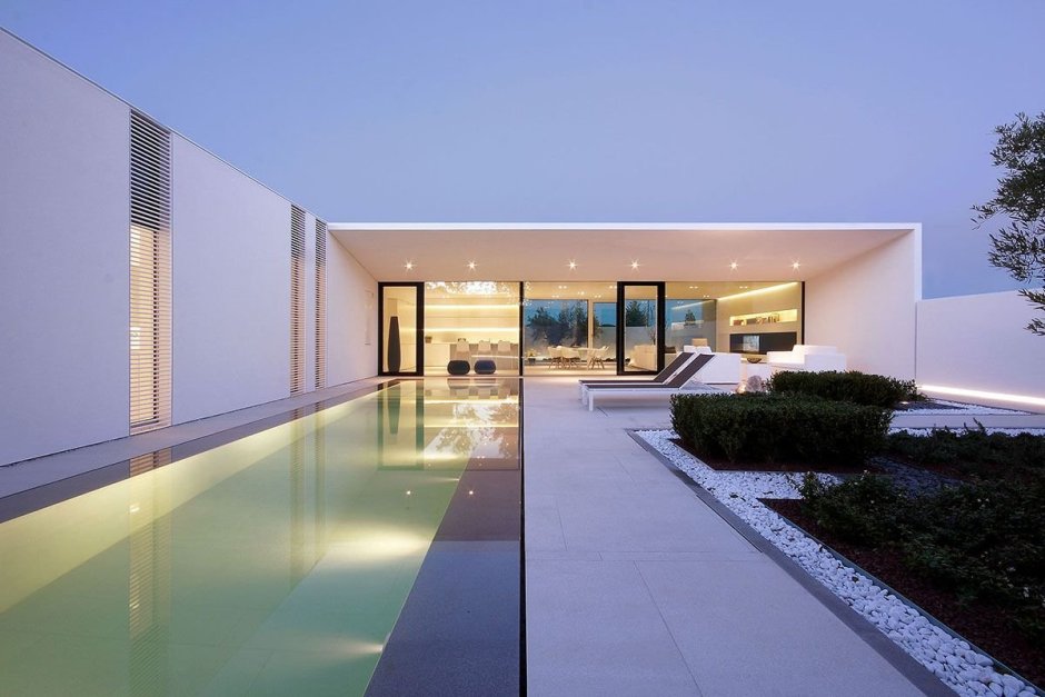 Jesolo Lido Pool Villa in Italy by JM Architecture