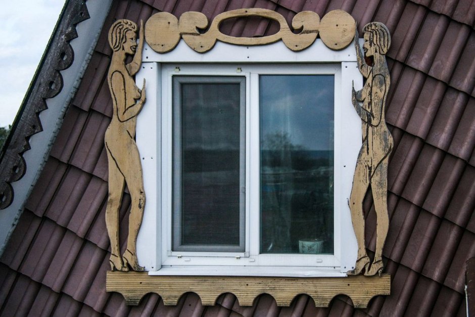 Оклады на окна в деревянном доме