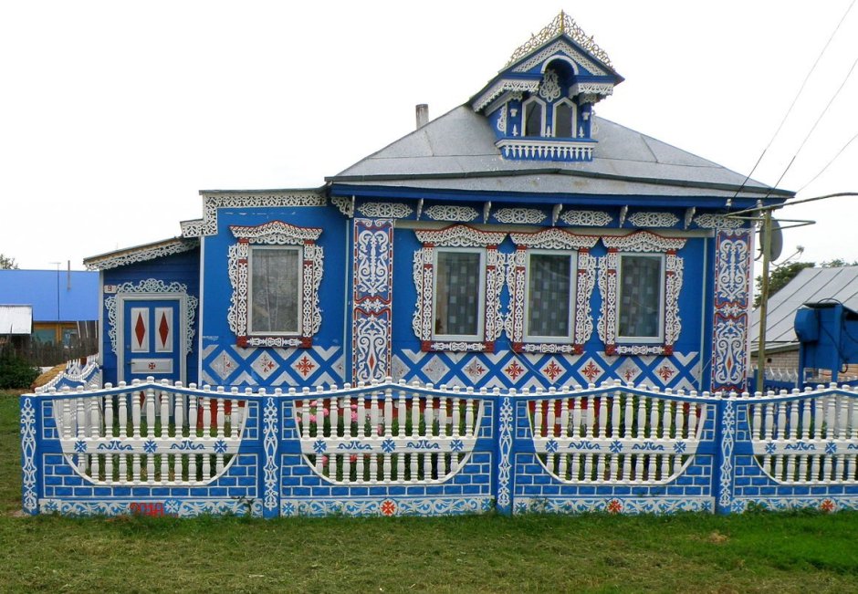 Пурех резной дом