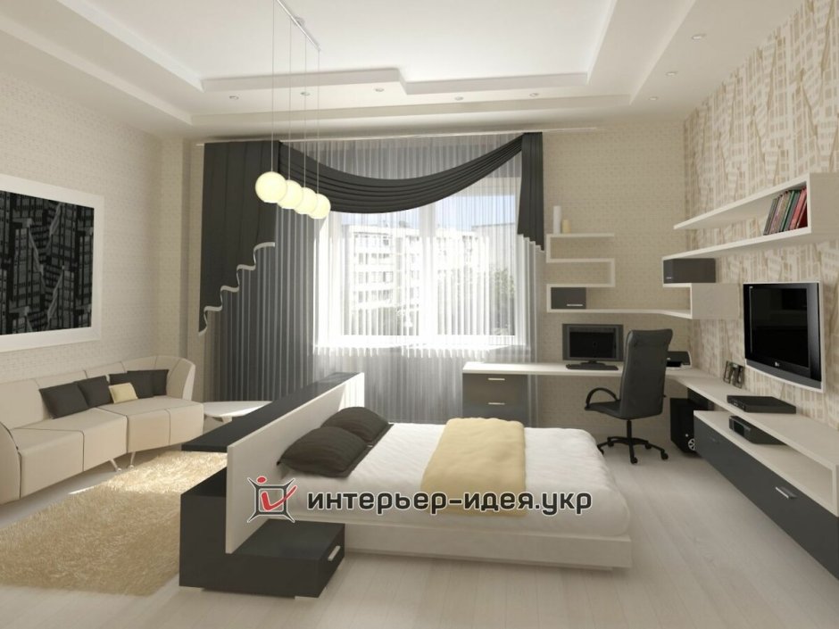 Интерьер спальной комнаты с компьютерным столом